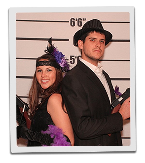 Los Angeles Murder Mystery party guests pose for mugshots