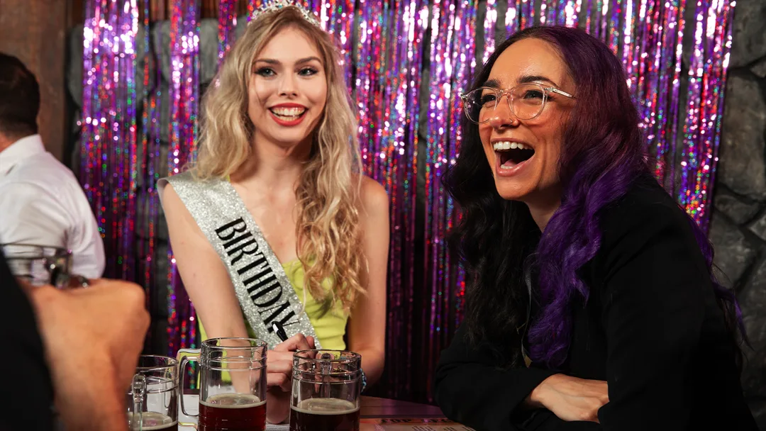 Guests celebrating at a Los Angeles murder mystery party